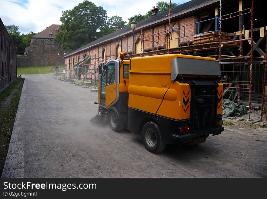 Small truck in cleaning work. Small truck in cleaning work