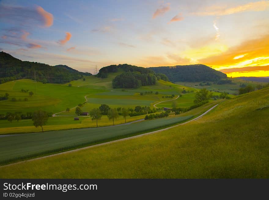 Colorful sunset on the field