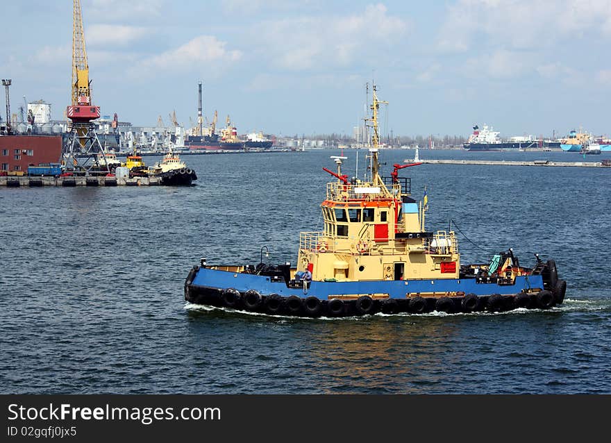 Moving tugboat