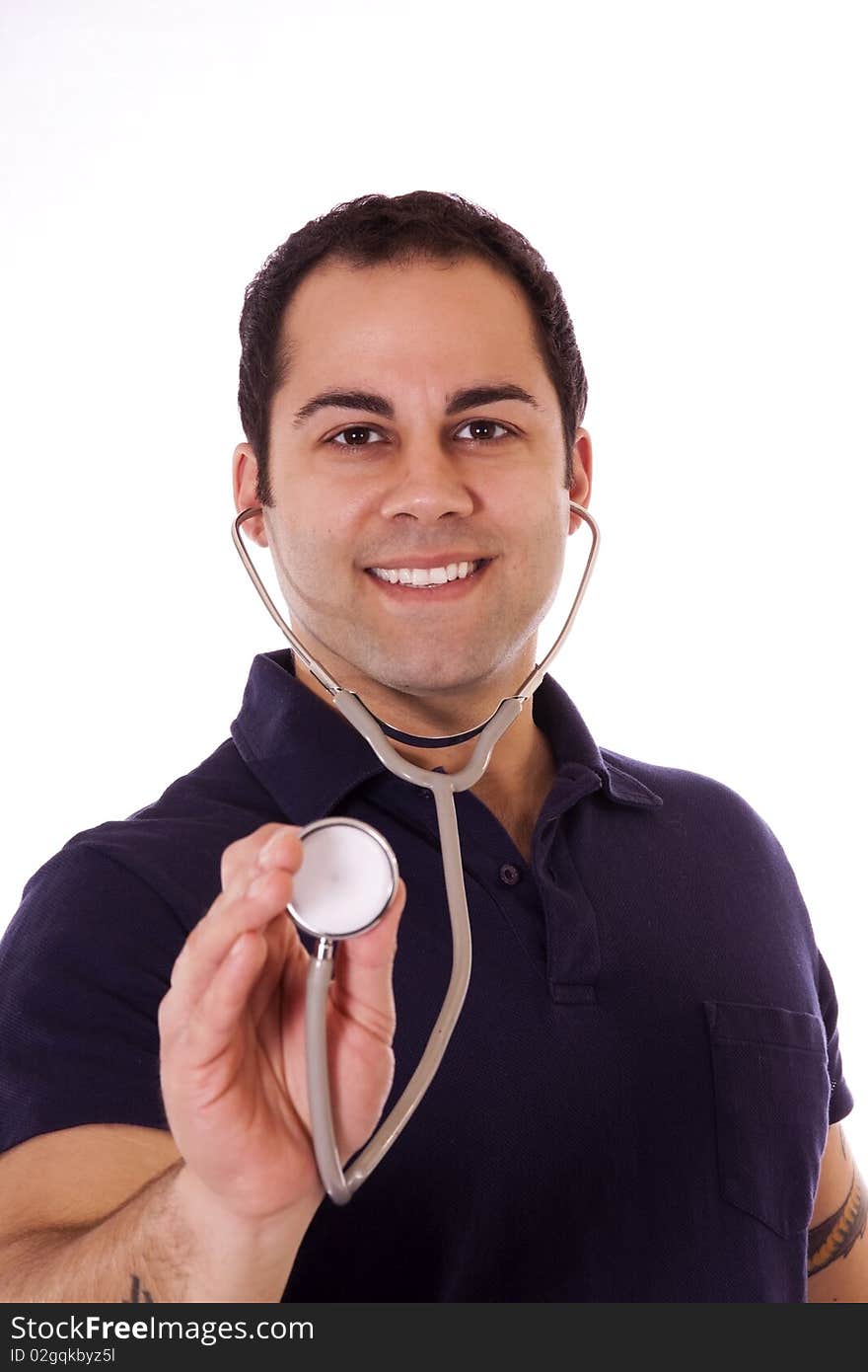 Young Hispanic male doctor holding his stethoscope. Young Hispanic male doctor holding his stethoscope