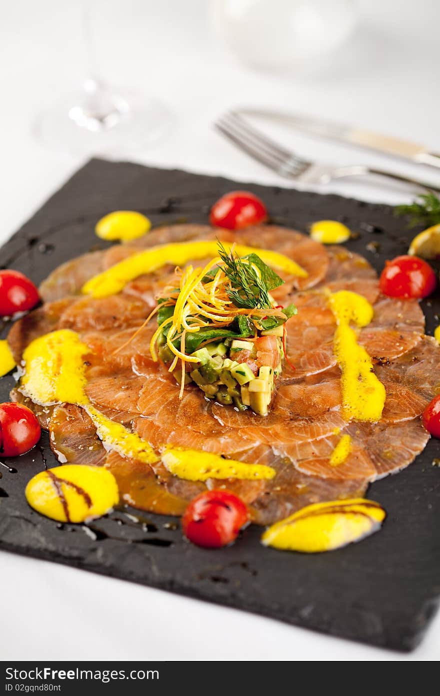 Salmon Carpaccio on Black Dish