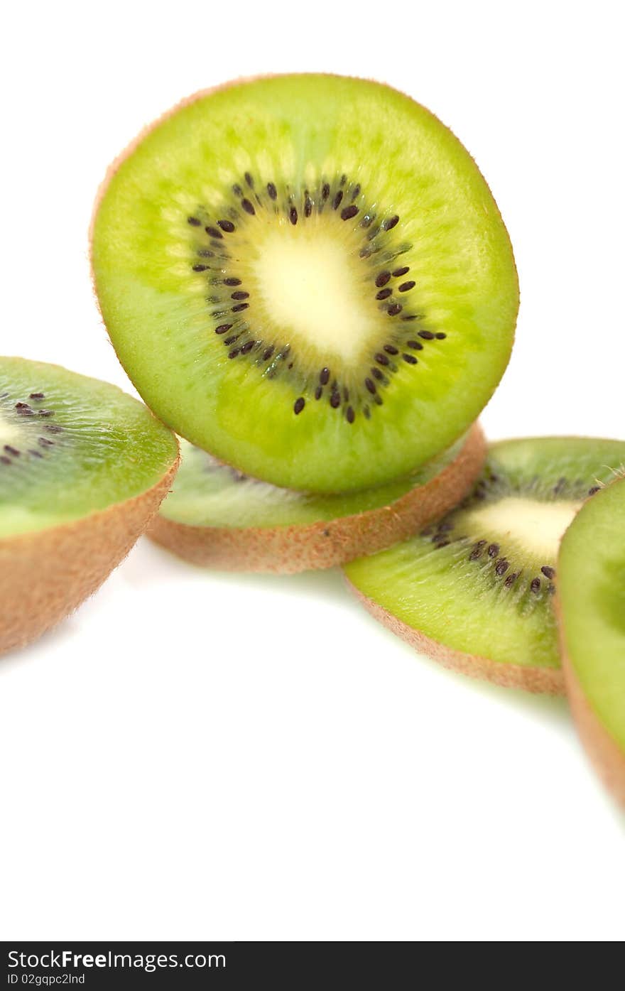 Sliced kiwis on a white background. Sliced kiwis on a white background