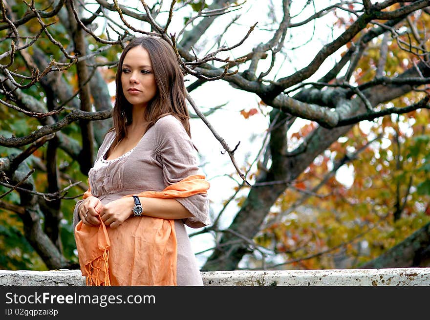 Young charming woman in autumn time