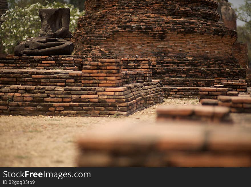 Alone the sitting buddha in the wreck of the ancient temple. Alone the sitting buddha in the wreck of the ancient temple.