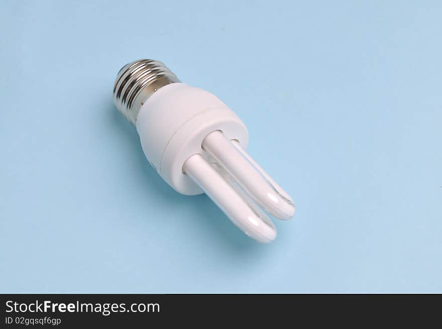 Energy-saving lamps in the light blue background。