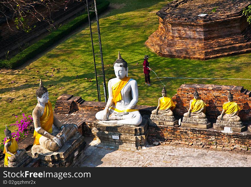 Buddha statues at the temple of Wat Yai Chai Mongkol in Ayutthaya near Bangkok, Thailand. Buddha statues at the temple of Wat Yai Chai Mongkol in Ayutthaya near Bangkok, Thailand