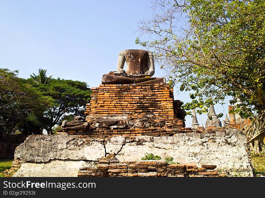 Headless buddha statue with altar in famous temple area Wat Phra Si Sanphet, Royal Palace in Ajutthaya