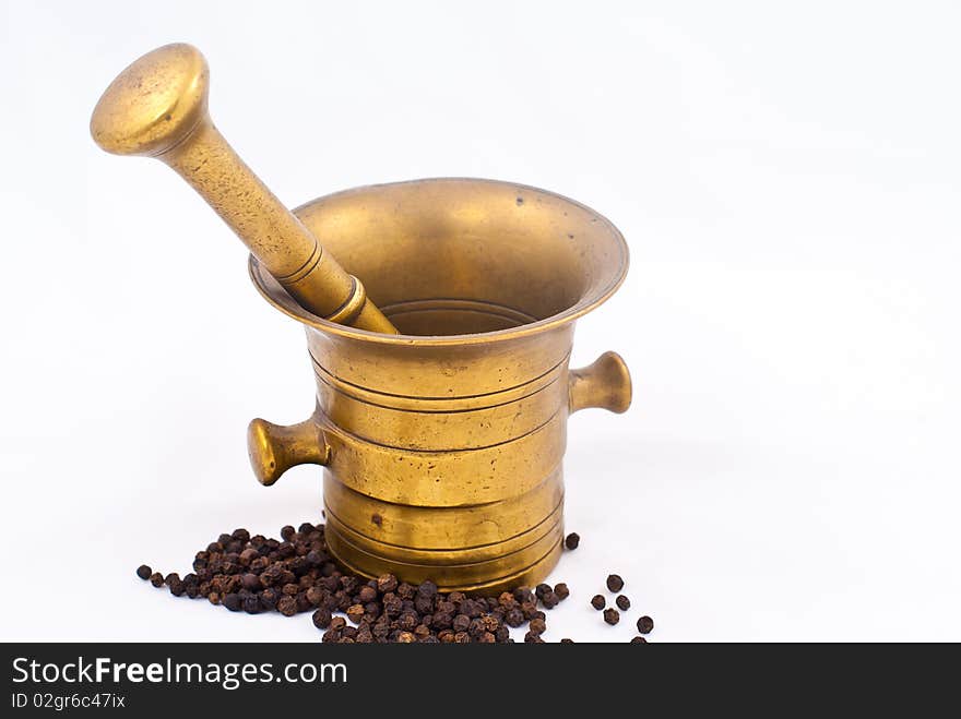 Copper mortar isolated on a white background