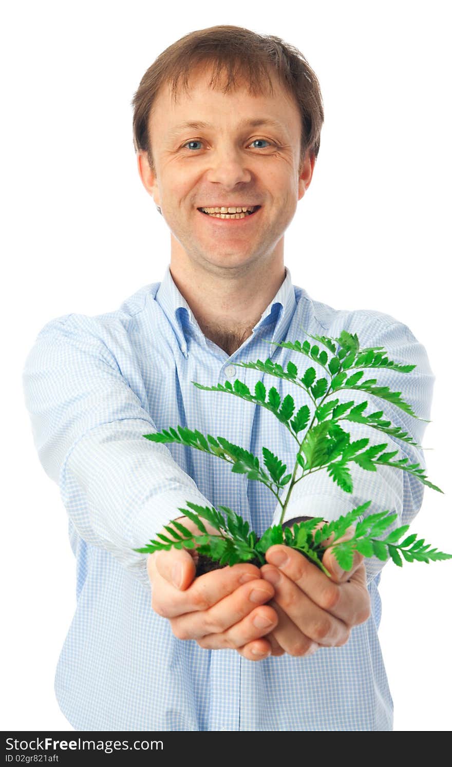 The businessman with a green plant isolated on a white background