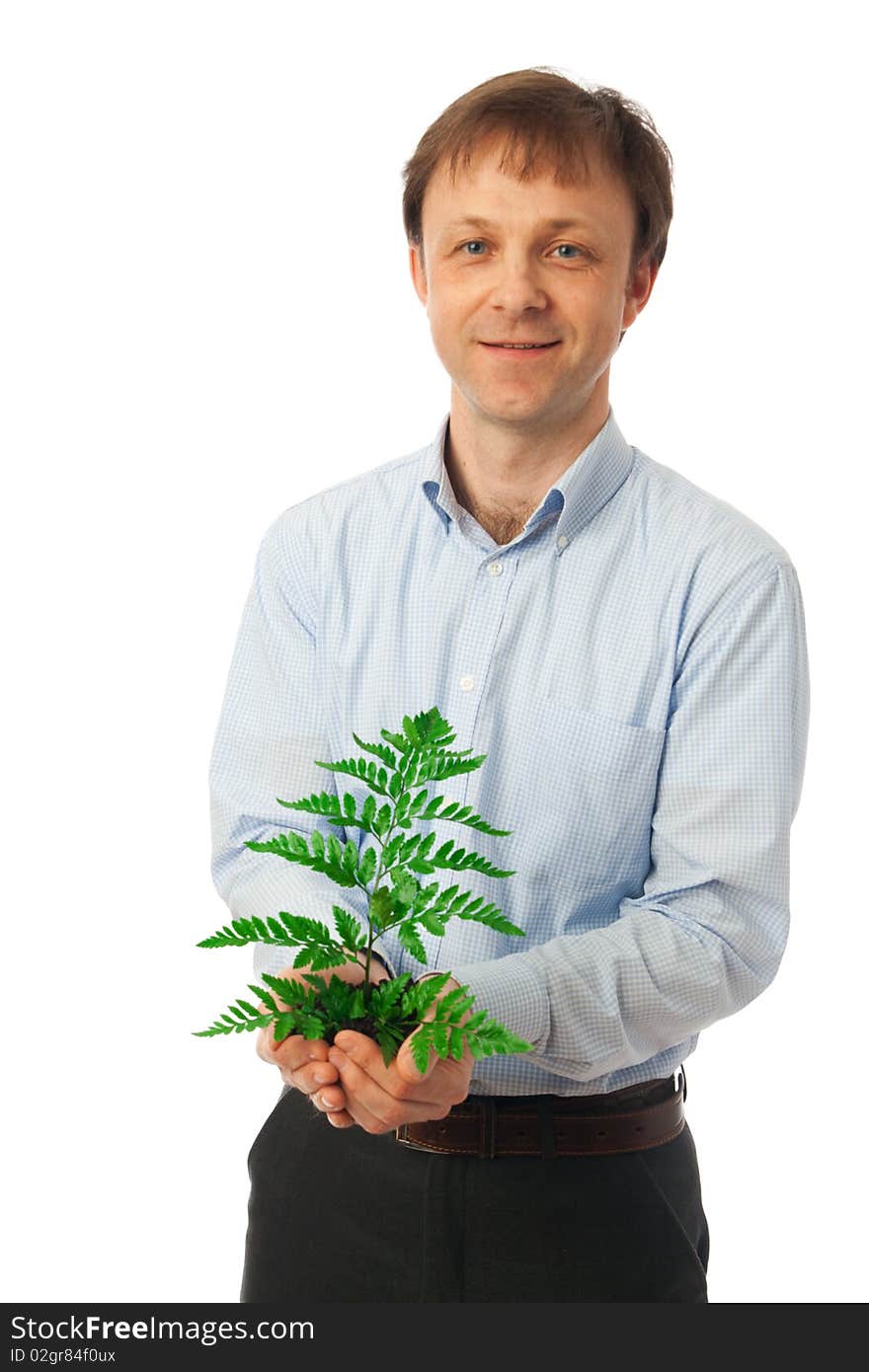 The businessman with a green plant isolated on a white background