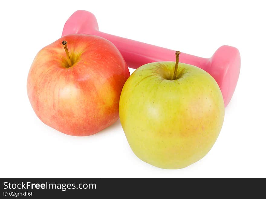 Pink dumbbells and two apples on a white background. Pink dumbbells and two apples on a white background