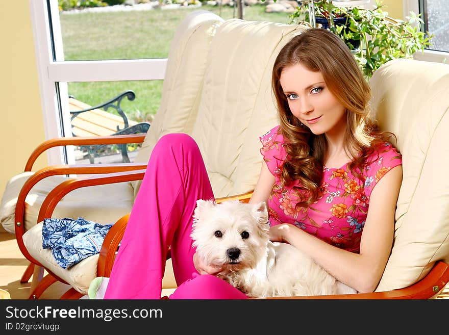 Beautiful woman with white dog