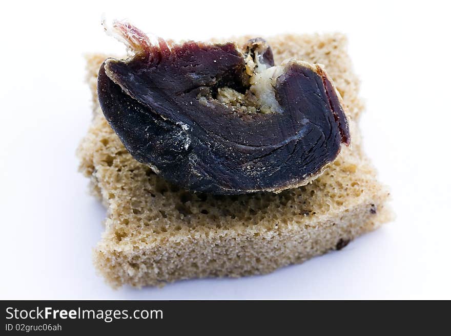 Piece of house meat of bread lying on a piece. Piece of house meat of bread lying on a piece