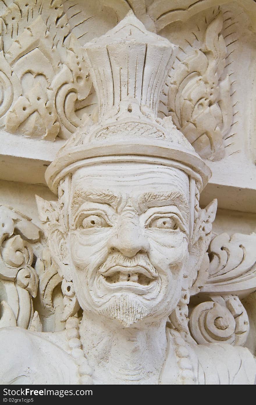 The fierce face of yogi sculpture in Wat Chulamanee, Amphawa, Thailand