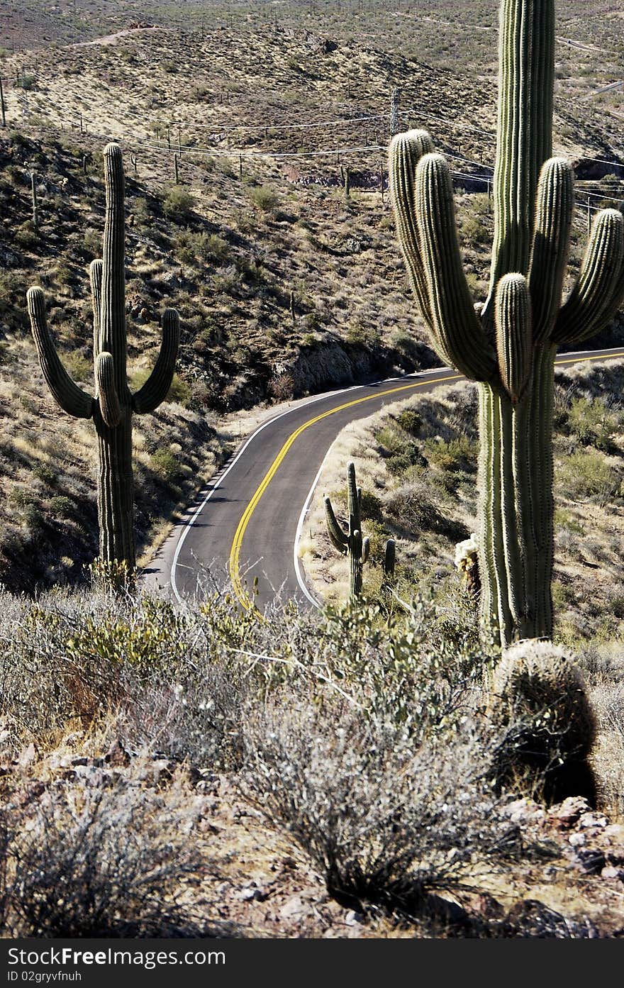 A winding road through the desert hills in Arizona. A winding road through the desert hills in Arizona.