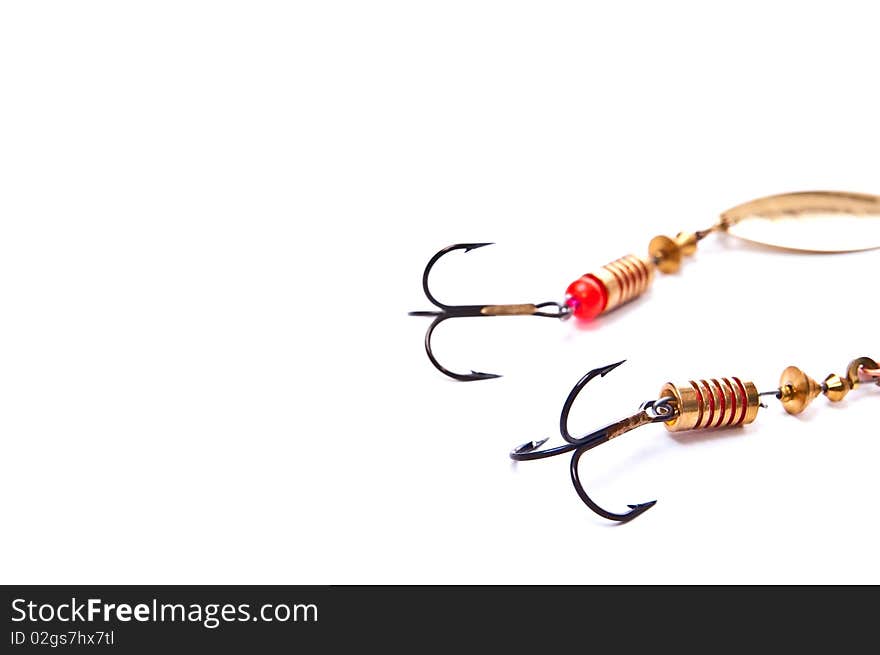 Two fishing hooks with clipping paths isolated on white. Two fishing hooks with clipping paths isolated on white