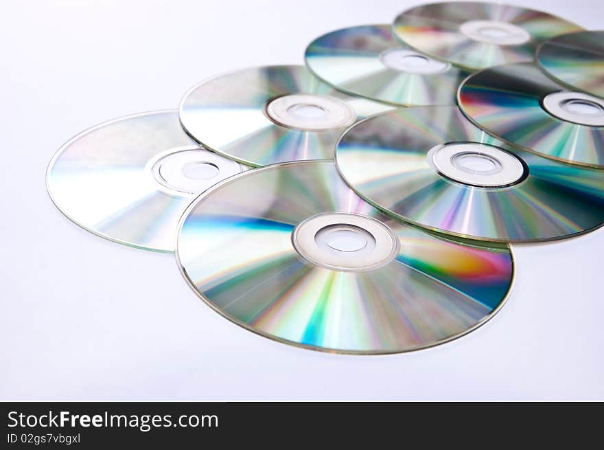 Many dvd disks on the grey background