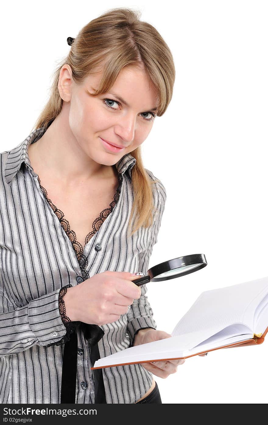 Businesswoman looking papers with magnifying glass on a white background. Businesswoman looking papers with magnifying glass on a white background