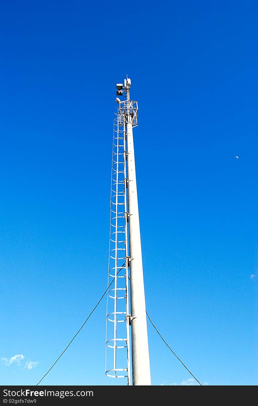 The wireless device for cellular communication(connection) on a background of the light-blue sky