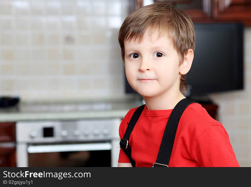 Boy at a kitchen