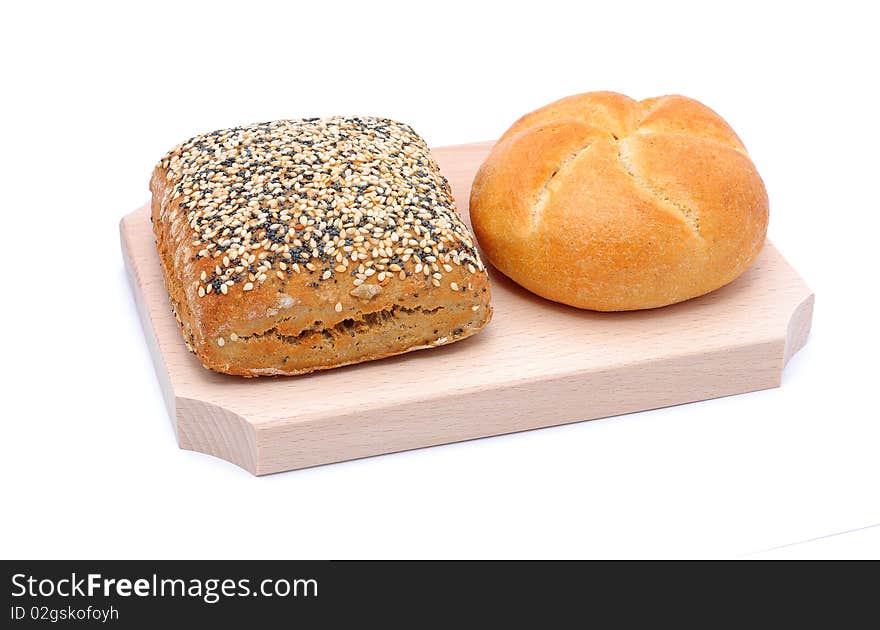 Two different types of bread isolated on a white background