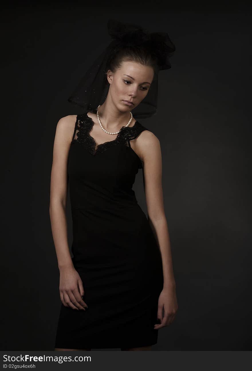 Young woman in black dress