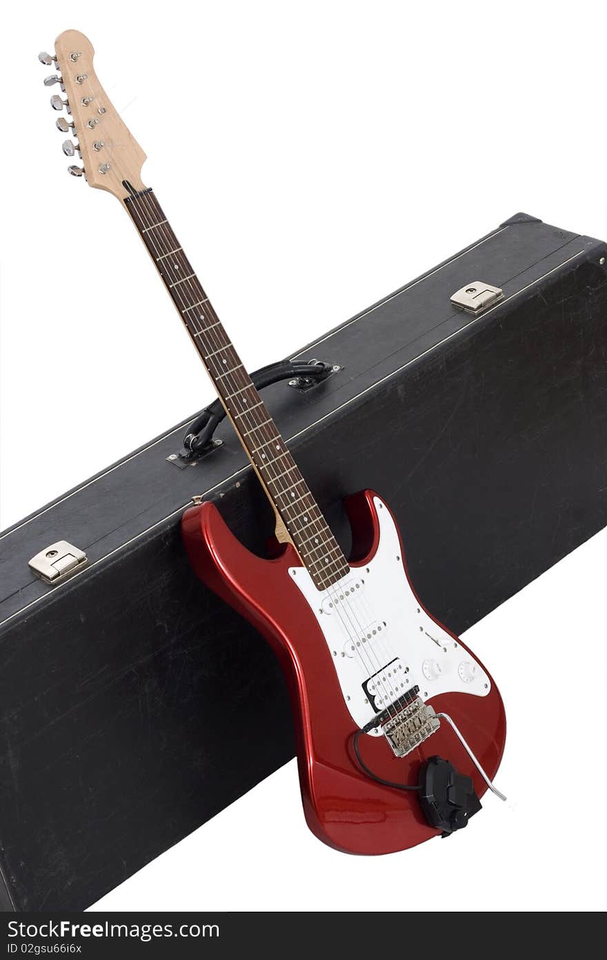 Red electric guitar isolated on white