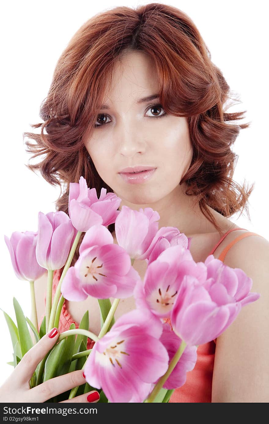 Beautiful woman with flowers isolatedon white