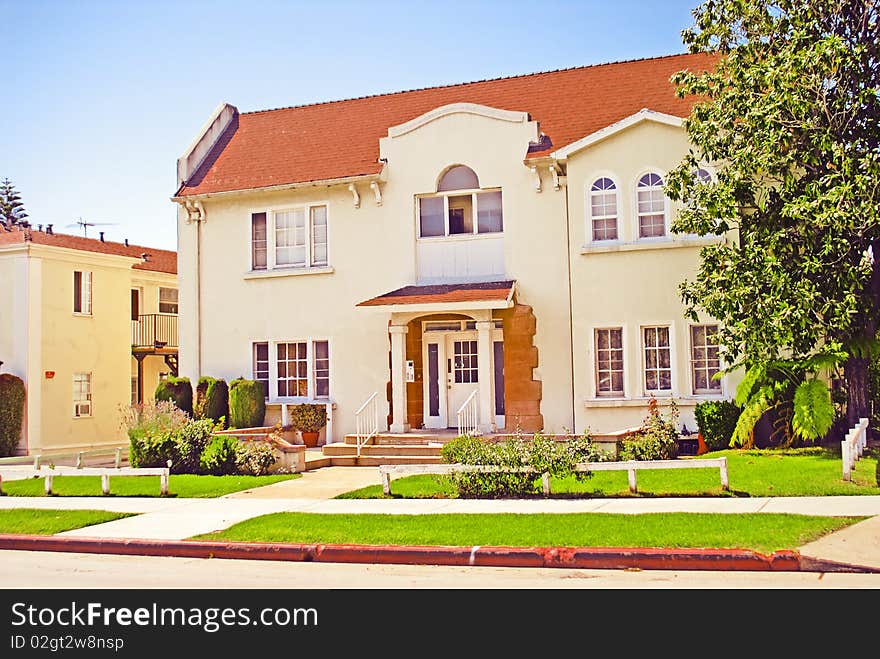 A beautiful house witha green frontyard. A beautiful house witha green frontyard