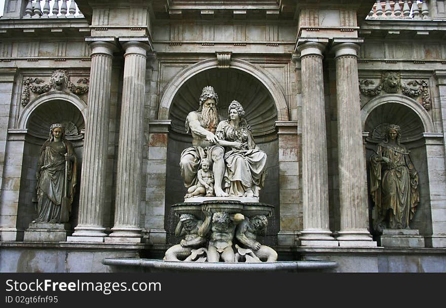 The impressive and grand imperial fountain decorating the entrance to the Hofburg imperial palace in Vienna Austria. Built in classic renaissance style the statue is an allegory of the Austrian rivers. The impressive and grand imperial fountain decorating the entrance to the Hofburg imperial palace in Vienna Austria. Built in classic renaissance style the statue is an allegory of the Austrian rivers.