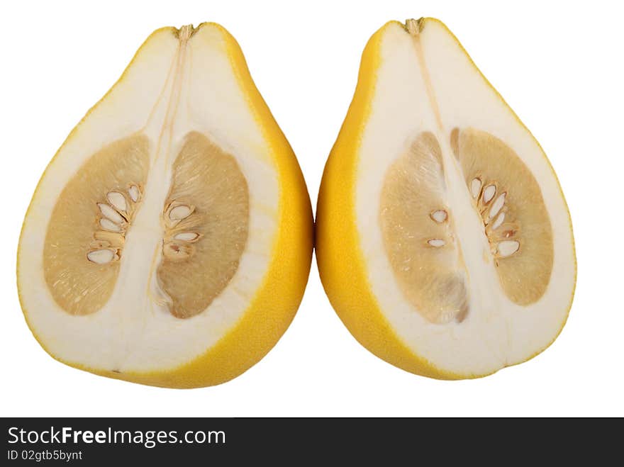 Two halves of fruit pomelo lie nearby