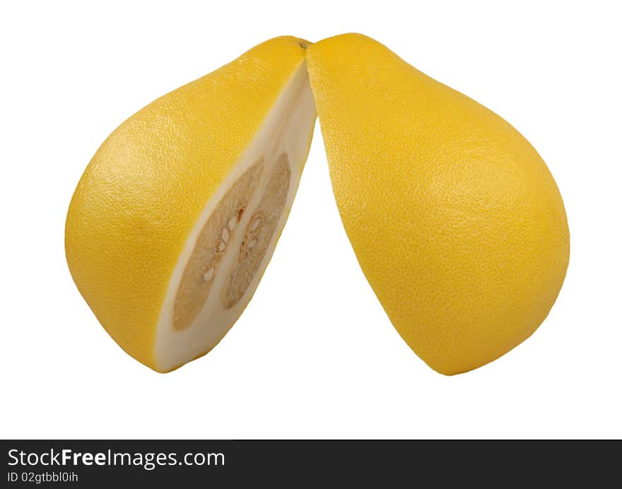 Two halves of fruit pomelo lie nearby