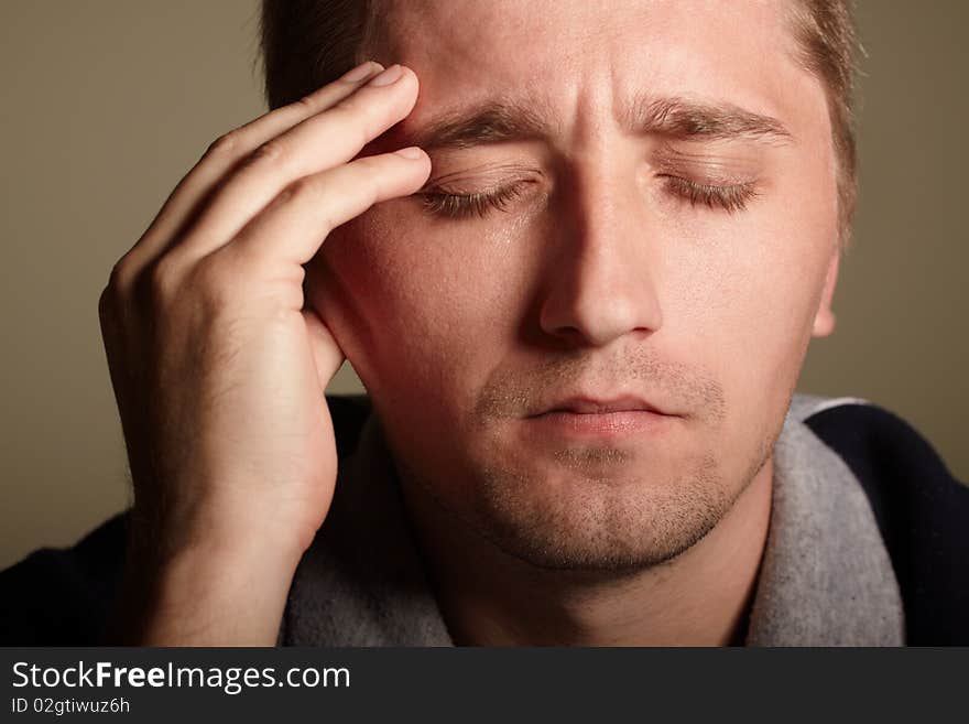 Young man thinking. studio shot