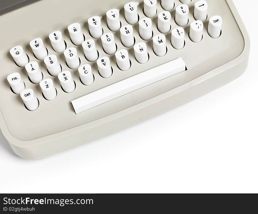 Closeup of a retro typewriter keyboard isolated on white background