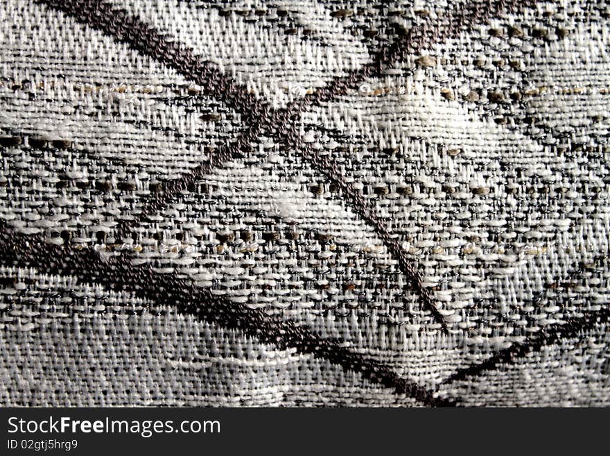Sample of a gray coloured upholstery texture horizontal pattern. Sample of a gray coloured upholstery texture horizontal pattern.