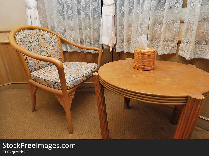 Tea table and chair in high class hotel room. Suitable for concepts such as travel, tourism, vacation and holiday. Tea table and chair in high class hotel room. Suitable for concepts such as travel, tourism, vacation and holiday.