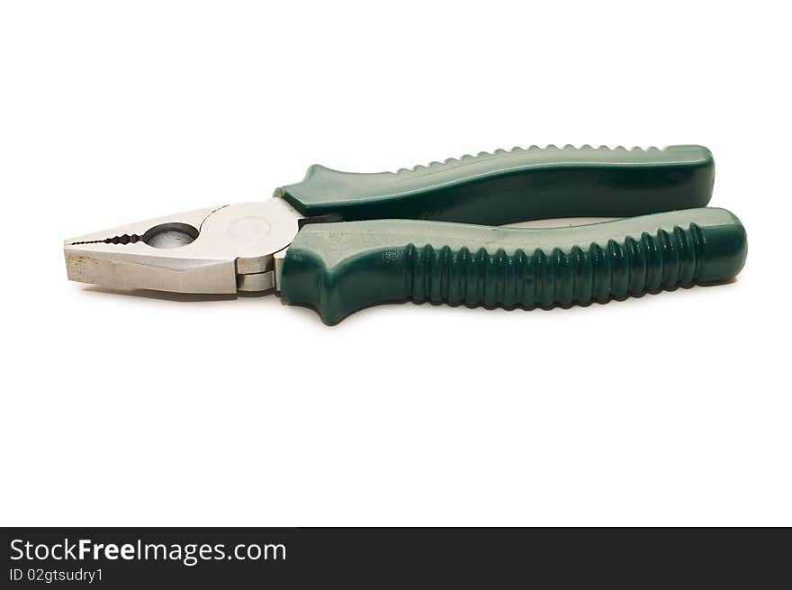 The green pliers isolated over white