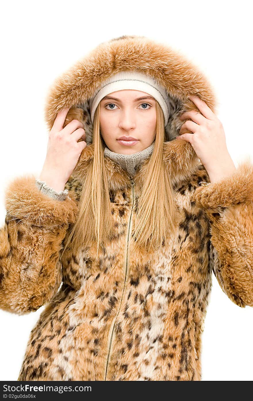 The Girl In A Fur Coat Isolated Over White