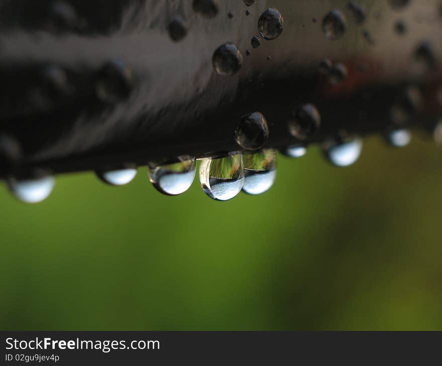 Dew droplets on metal edge, macro, wallpaper