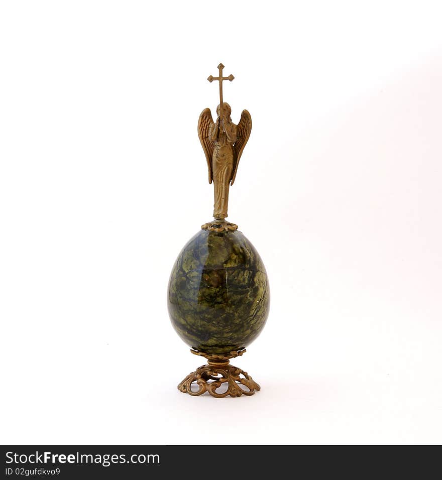 Easter Egg Made Of Stone With A Religious Figure