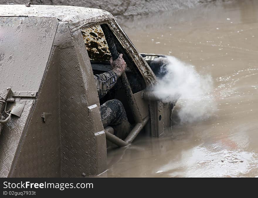 Off road car participating in off-road challenge