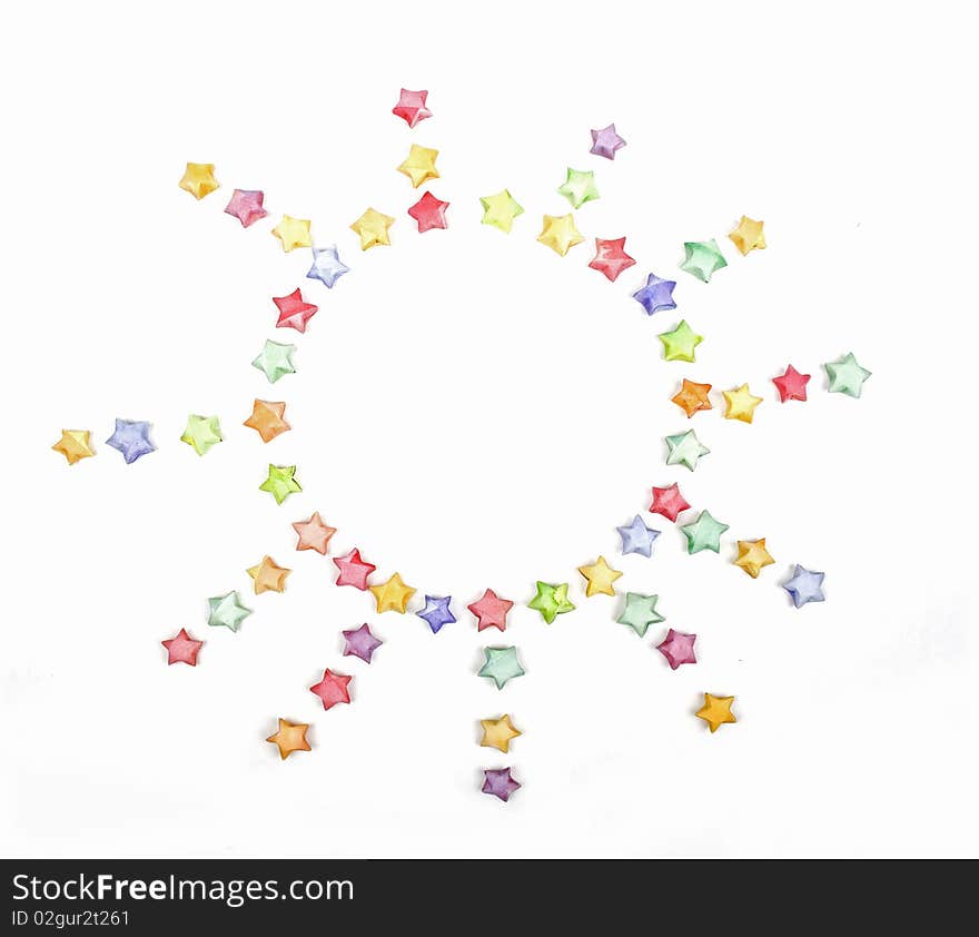 Color lucky stars origami sun on white background