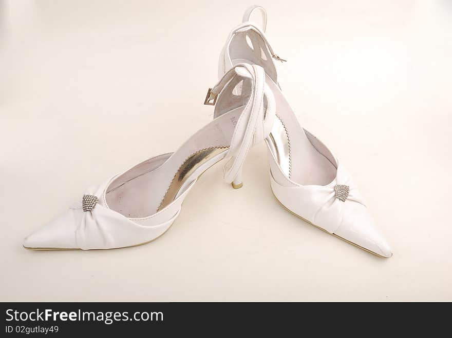 Celebratory female white shoes on a white background