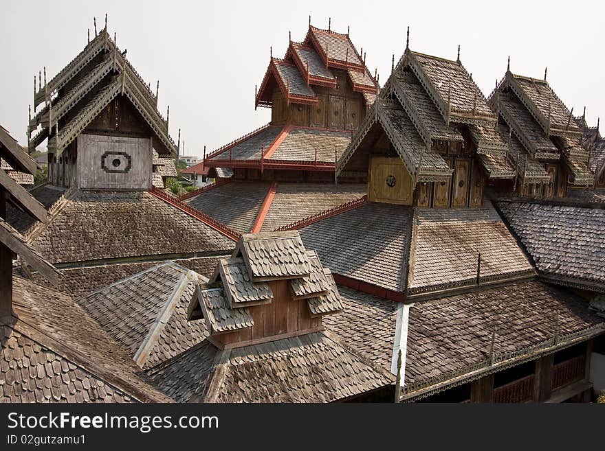 Wooden roof of thai ancient temple.
Generality in Thailand, any kind of art decorated in Buddhist church, temple pavilion, temple hall, monk's house etc. created with money donated by people to hire artist. They are public domain or treasure of Buddhism, no restrict in copy or use, no name of artist appear (but, if there is artist name, it only for tell who is the artist of work, not for copyright