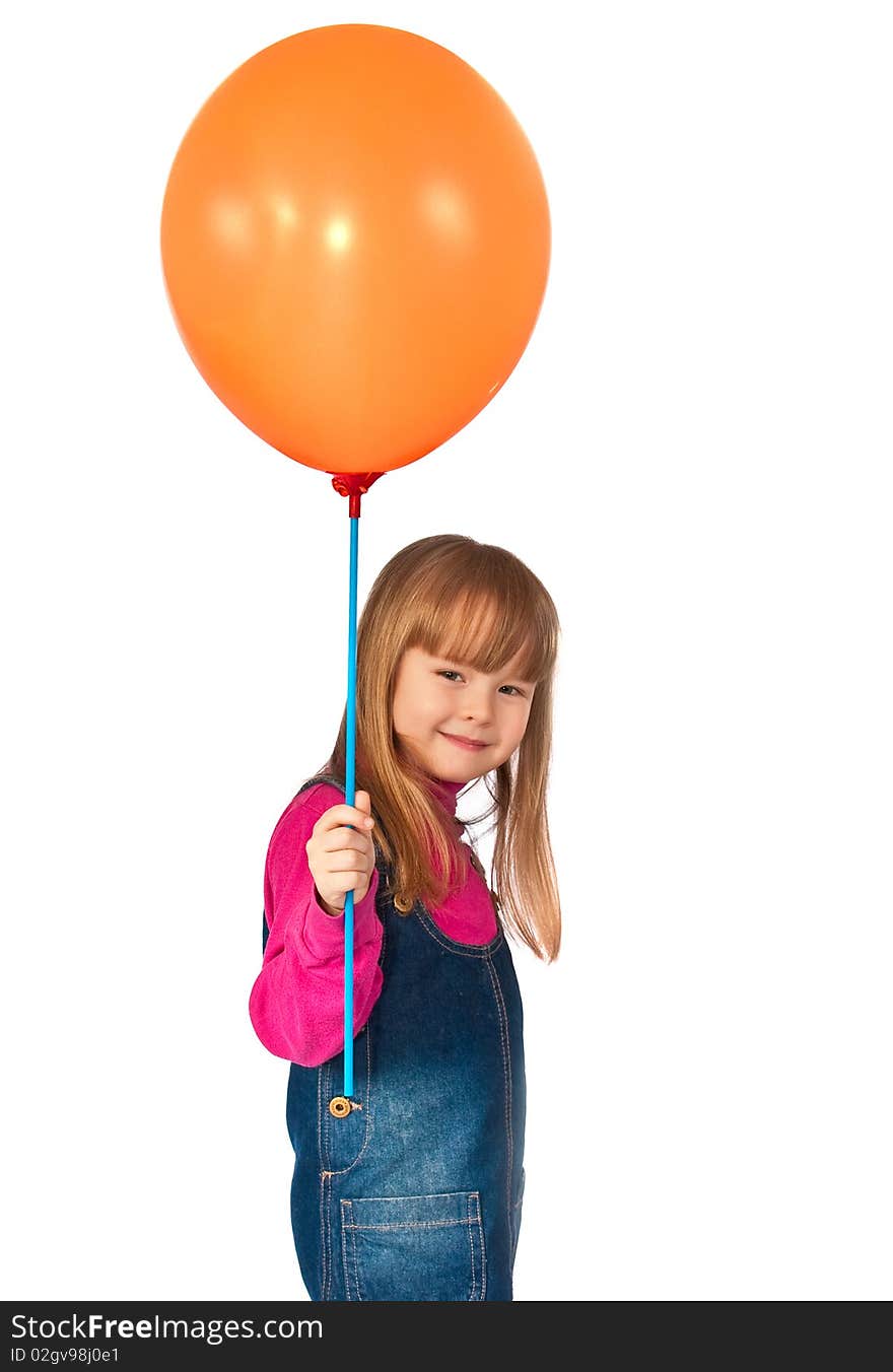 Little girl holds balloon in hand