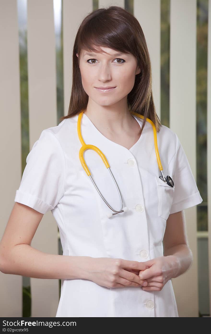 Portrait of female nurse in medical office