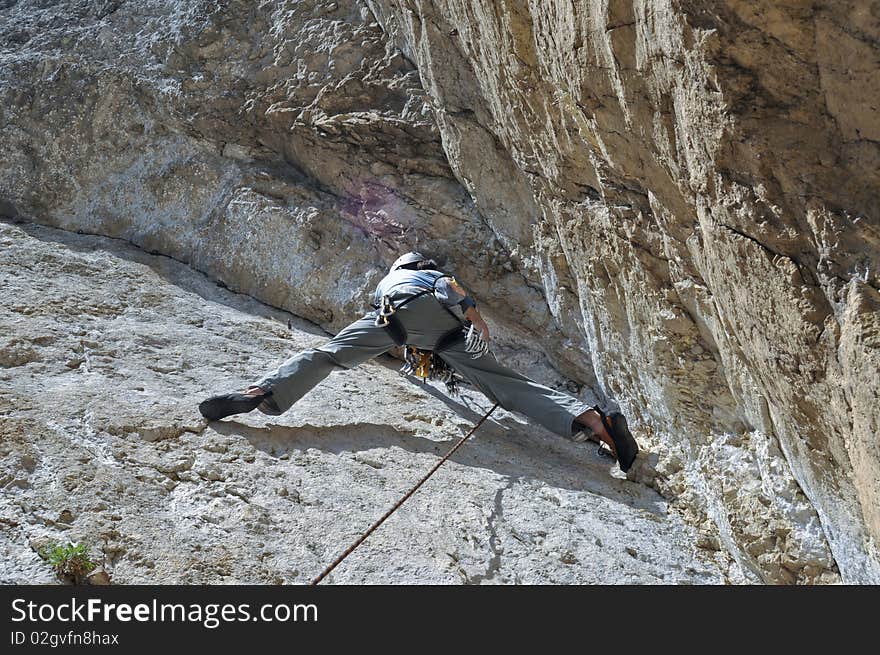 Rock climber on a difficult route