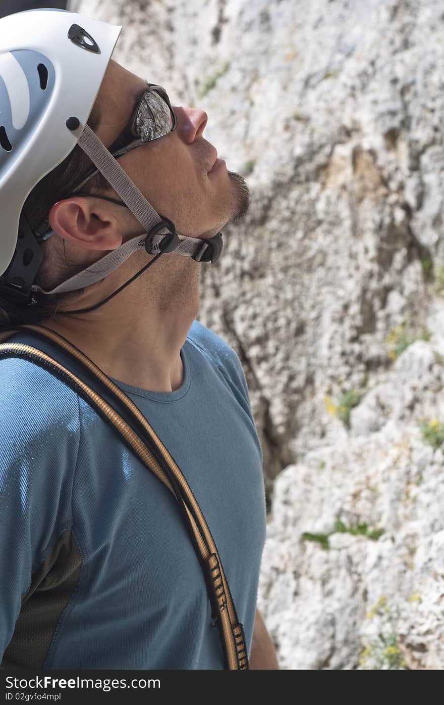 Rock climber previewing a route