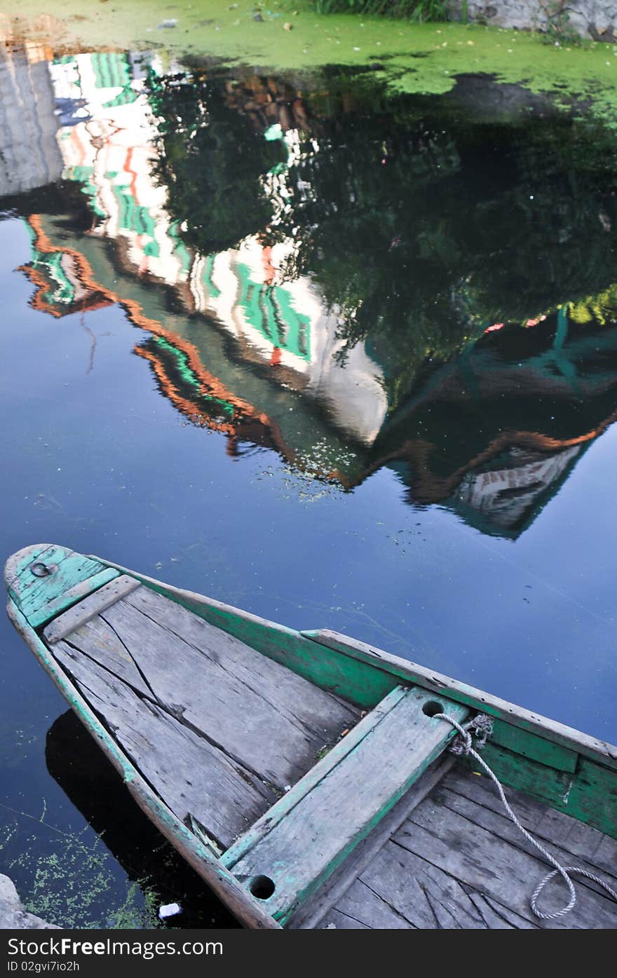 Reflection of a house on the Dal Lake, Srinagar, India. Reflection of a house on the Dal Lake, Srinagar, India