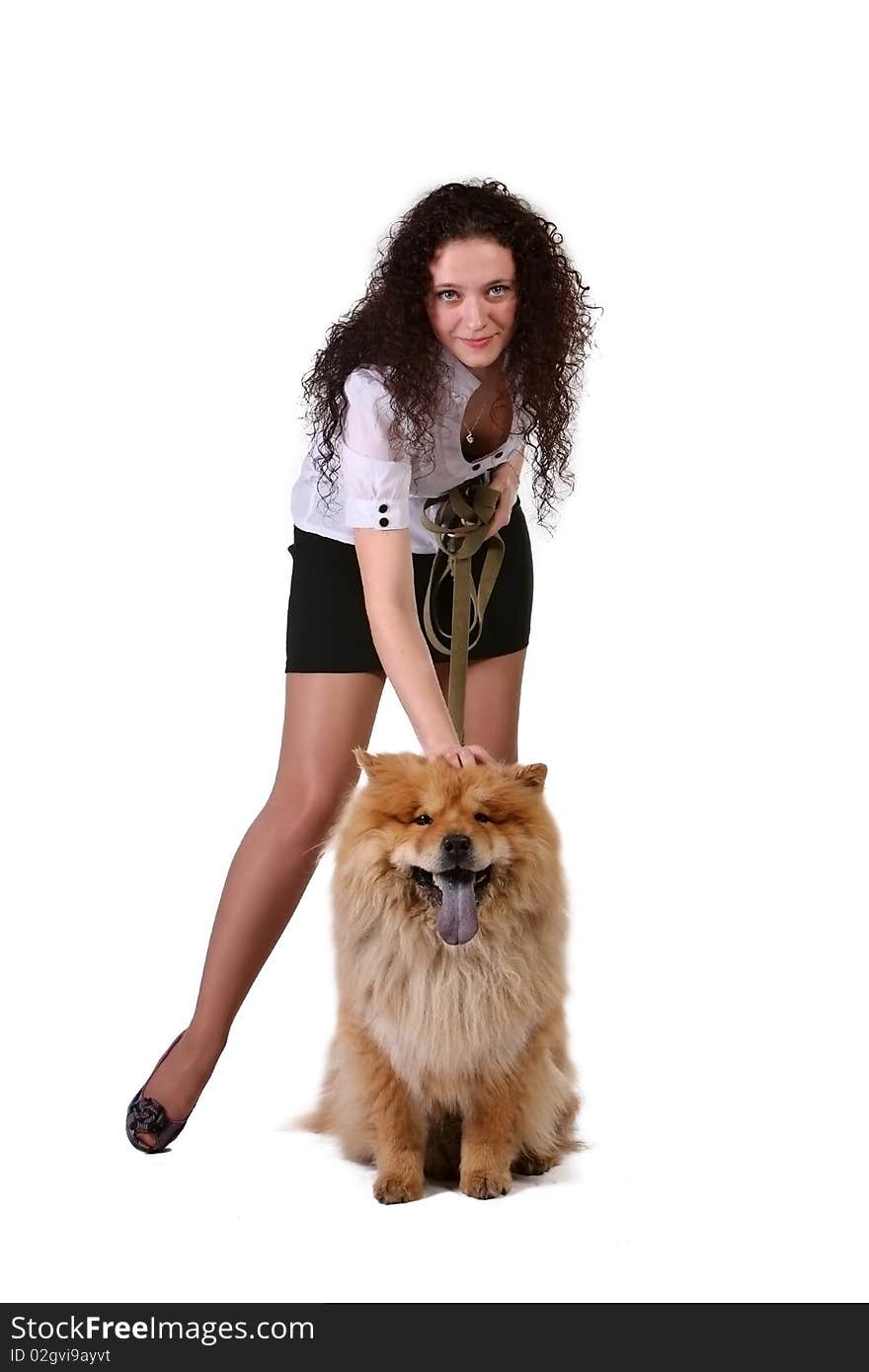 A pretty young woman with chow chow dog. A pretty young woman with chow chow dog